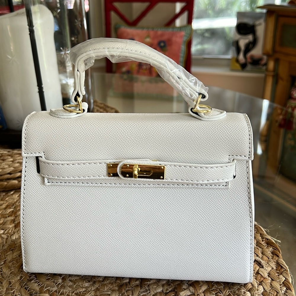 kelly mini leather bag 6”h x 81/4w @ bottom